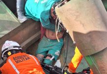 Bombeiros resgata homem que ficou preso no eixo de colheitadeira em fazenda