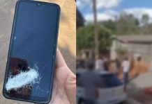 Homem é baleado durante briga e é salvo por celular